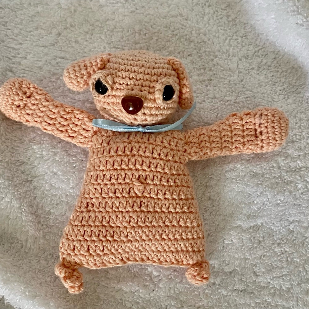 Hand crafted crocheted baby doggie.